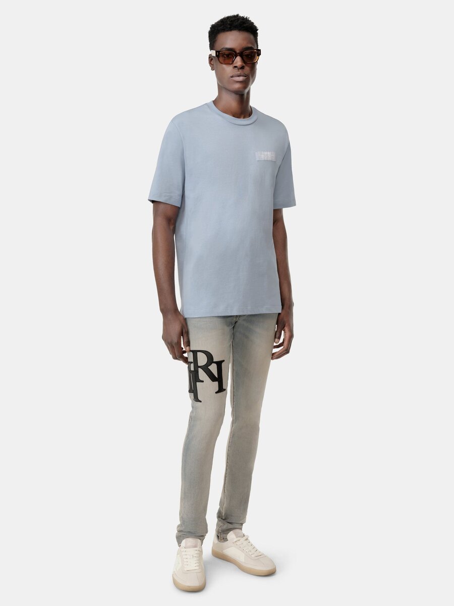 STAGGERED LOGO SKINNY JEAN