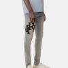 STAGGERED LOGO SKINNY JEAN