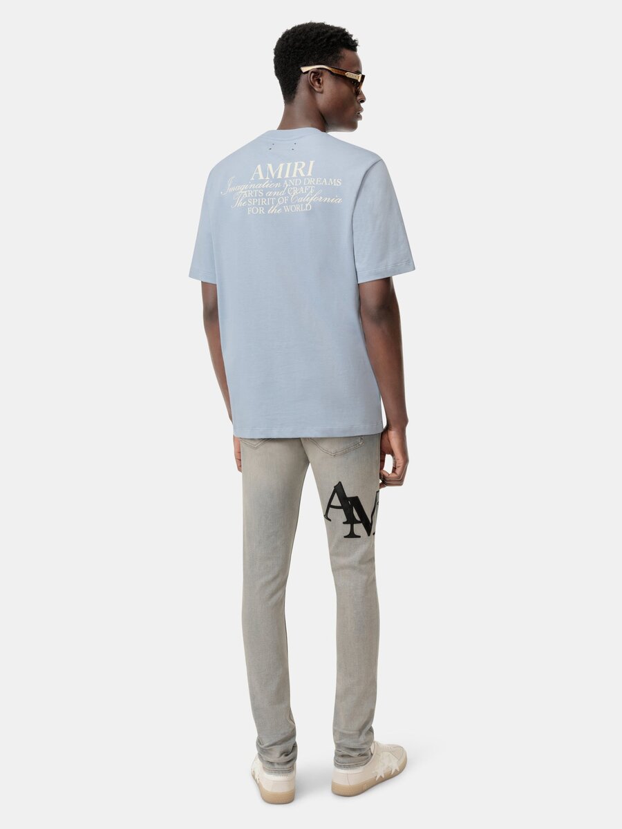 STAGGERED LOGO SKINNY JEAN